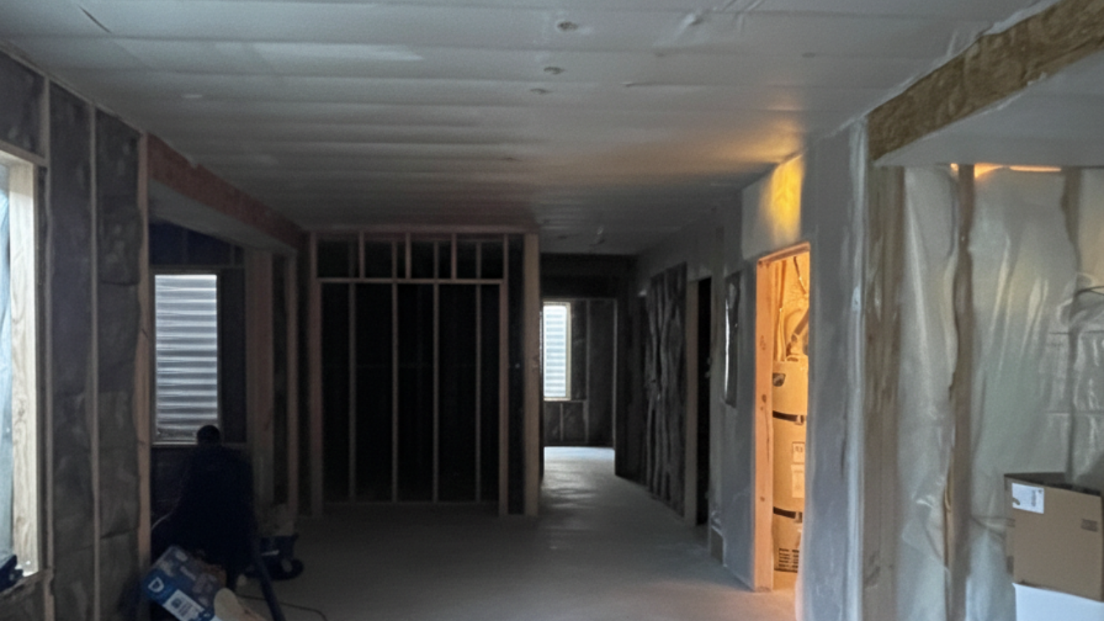 Drywall installation before and after - open space - after